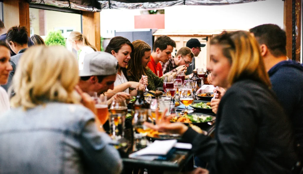 Group-Friendly Restaurants group of friends eating together